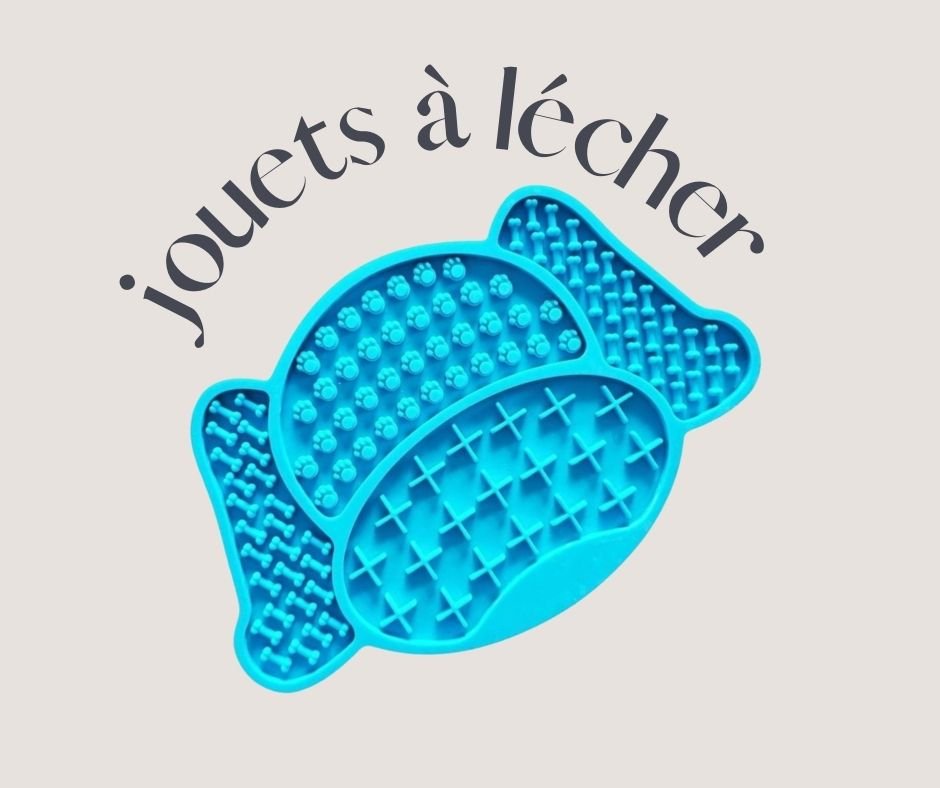 Photographie d'un tapis à lécher en forme de tête de chien et de couleur bleue.